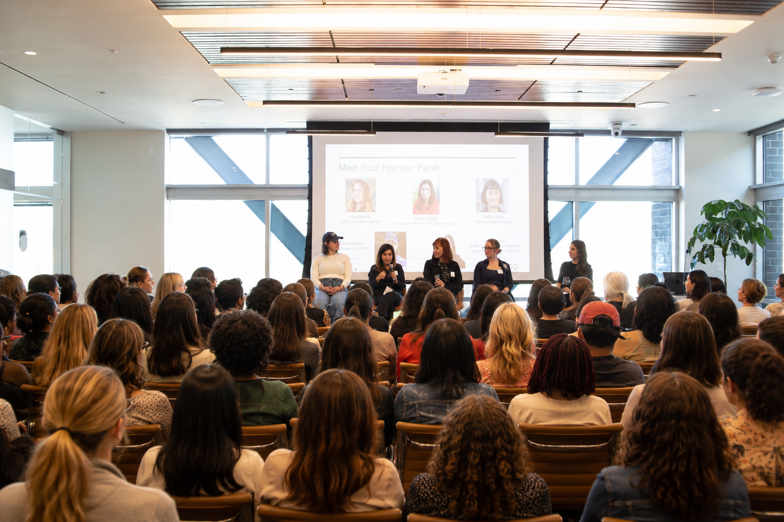 WAAC founder panel speaking to a full audience at a TAO event.